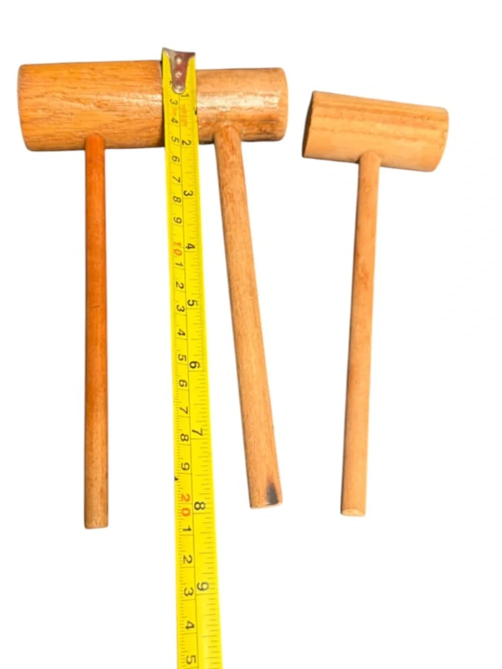 traditional wooden mallets, commonly used for tasks like cracking shellfish,